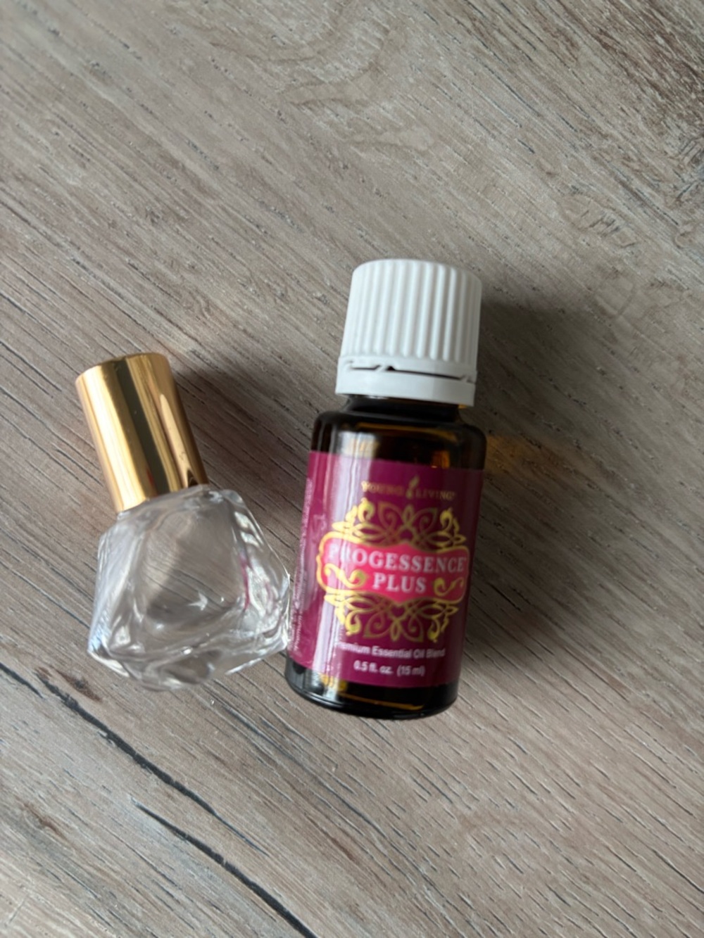Young Living Progessence Plus Oil w / roller bottle